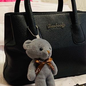 Teddy bear leather handbag